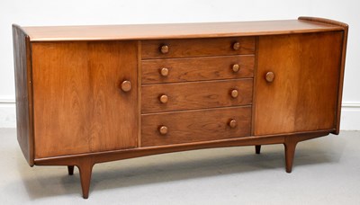Lot 44 - A 1970s teak sideboard, with two cupboard...