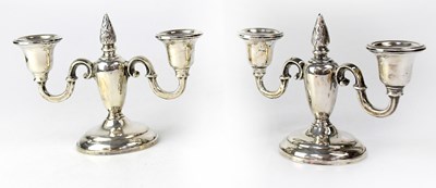 Lot 835 - A pair of Canadian silver squat twin-branch...