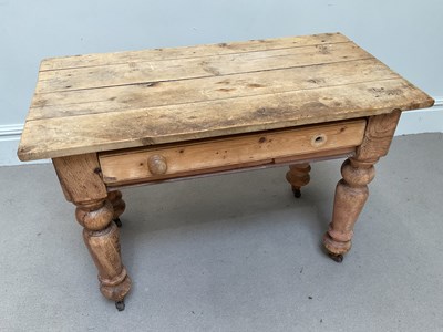 Lot 75 - A rustic pine single drawer table, height 70cm,...