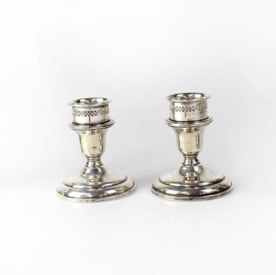 Lot 834 - A pair of Canadian silver squat candlesticks...