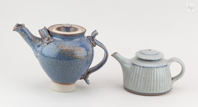 Lot 173 - DAVID BACKHOUSE; a stoneware teapot covered in...