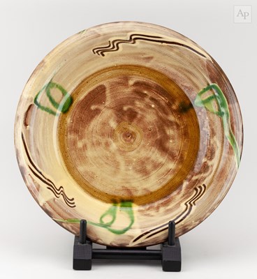 Lot 147 - CLIVE BOWEN (born 1943); a slipware charger...