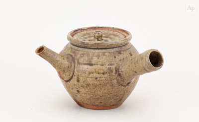 Lot 551 - SHOJI HAMADA (1894-1978); a small stoneware...