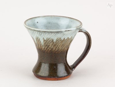 Lot 578 - TATSUZO SHIMAOKA (1919-2007); a stoneware mug...