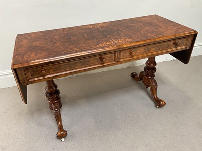 Lot 124 - A Victorian inlaid figured walnut sofa table,...