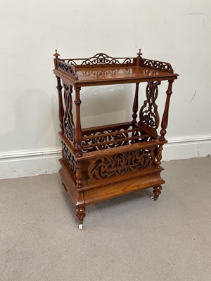 Lot 1191 - A Victorian figured walnut Canterbury whatnot,...