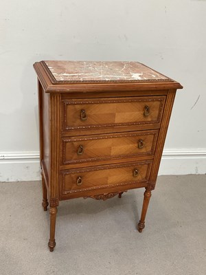Lot 186 - A reproduction French walnut bedside chest,...