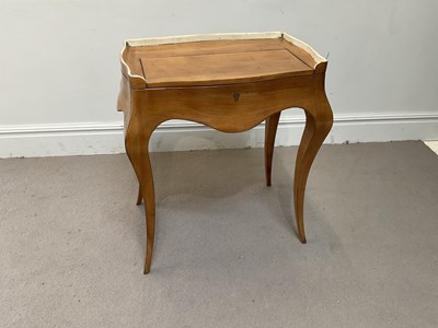 Lot 191 - A French walnut dressing table, with hinged...
