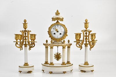 Lot 337 - A late 19th century French clock garniture,...