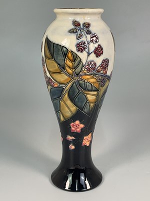 Lot 184 - MOORCROFT; a 'Blackberry Bramble' pattern vase,...