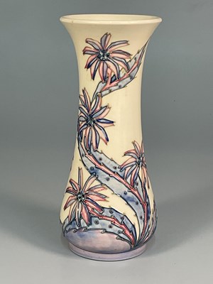 Lot 205 - MOORCROFT; a 'Daisy' pattern vase, designed by...