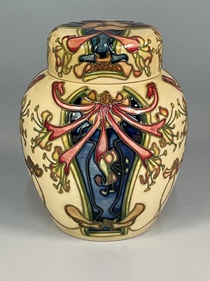 Lot 194 - MOORCROFT; a 'Honeysuckle' pattern ginger jar,...