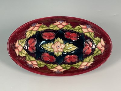 Lot 308 - MOORCROFT; a 'Morello Cherry' pattern oval...