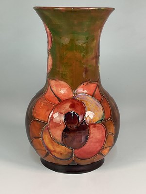 Lot 169 - MOORCROFT; a 'Flambe Rose' pattern vase,...