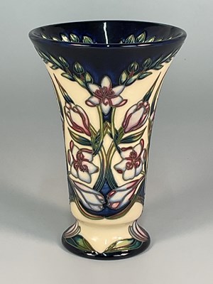 Lot 210 - MOORCROFT; a 'Kaffir Lily' pattern vase,...