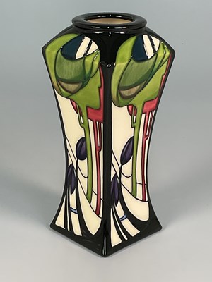 Lot 185 - MOORCROFT; a 'Penrith' pattern vase, designed...