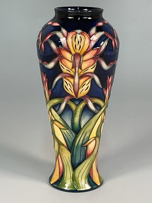 Lot 197 - MOORCROFT; a 'Lizard Orchid' pattern vase,...