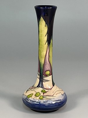 Lot 212 - MOORCROFT; a 'New Dawn' pattern vase, designed...