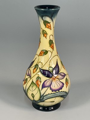 Lot 215 - MOORCROFT; a 'Sweet Thief' pattern vase,...