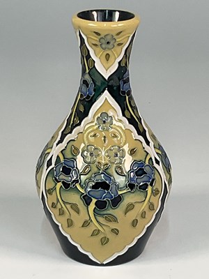 Lot 217 - MOORCROFT; a 'Faience Bouquet' vase, designed...