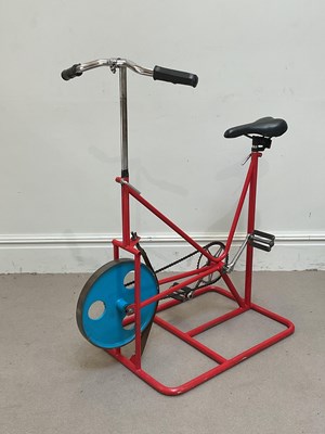Lot 1446 - A 1950s Achilles red painted excercise bike,...