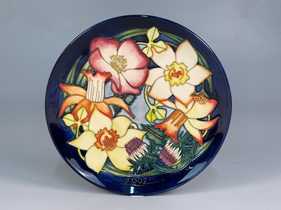 Lot 303 - MOORCROFT; a 'Golden Jubilee' plate 2002,...