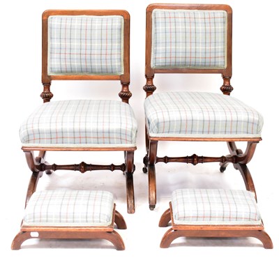 Lot 39 - A pair of Victorian Gothic mahogany salon arm...