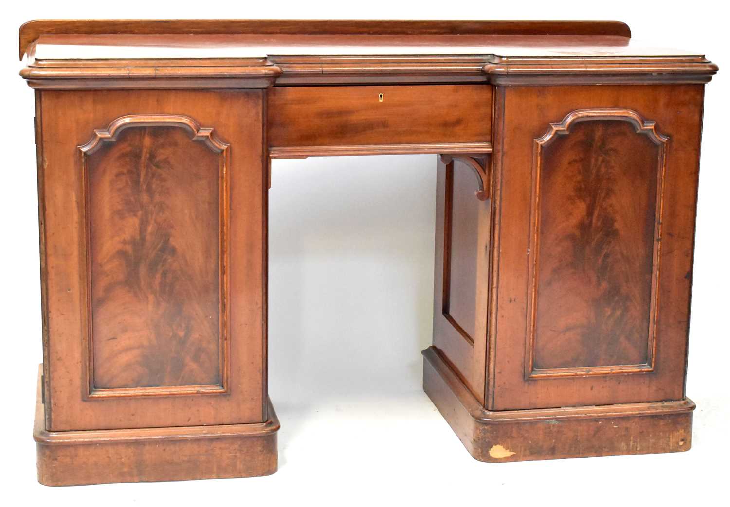 Lot 43 - A Victorian mahogany inverted breakfront...