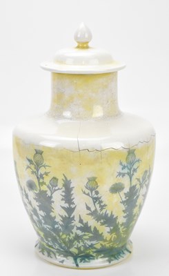 Lot 346 - RUSKIN; a large yellow lustre temple jar and...