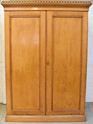 Lot 69 - A Victorian bird's-eye maple two-door wardrobe,...