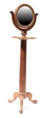 Lot 99 - An early Victorian mahogany shaving mirror, on...
