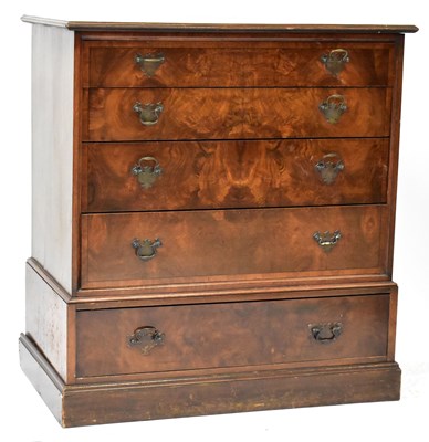 Lot 72 - A reproduction walnut chest, with five...