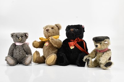 Lot 2062 - STEIFF; a collection of four bears comprising...