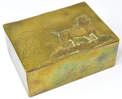 Lot 388 - A brass cigarette box with etched and relief...