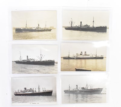Lot 555 - Approximately 1200 postcards and playing...