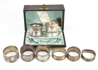 Lot 426 - A collection of five 800 grade napkin rings,...
