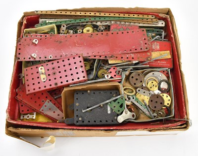 Lot 1809 - MECCANO; a collection of various pieces and sets.