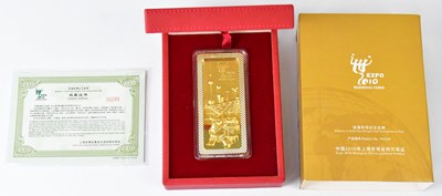 Lot 574 - A 24ct gold Expo 2010 Shanghai China ingot,...