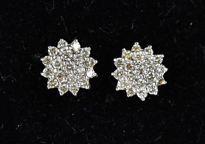 Lot 167 - A pair of yellow and white metal diamond set...