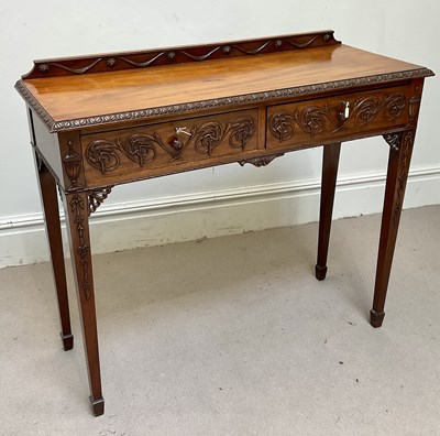 Lot 146 - A 19th century carved mahogany two drawer...