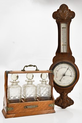 Lot 451 - An early 20th century oak three section...