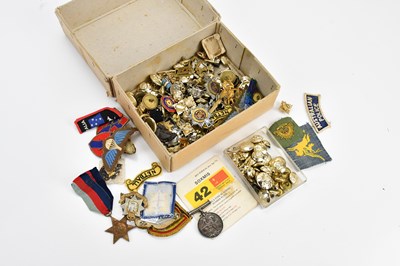 Lot 625 - A collection of military buttons, badges and...