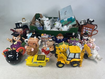Lot 245 - A large collection of novelty tea pots, to...