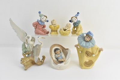 Lot 154 - NAO; seven high glazed porcelain figures...