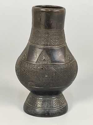 Lot 111 - A Chinese archaistic bronze vase, decorated...
