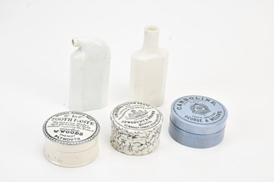 Lot 497 - Three ceramic toothpaste jars, with two flasks,...
