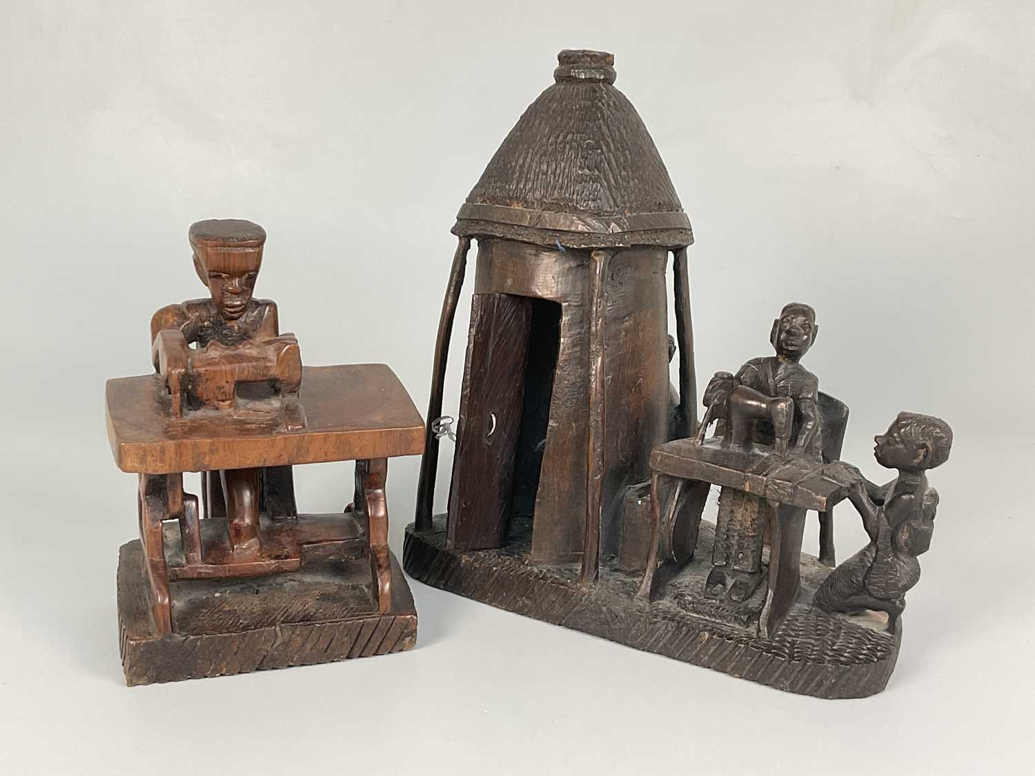 Lot 2 - An African hand carved hardwood sculpture...