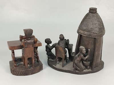 Lot 2 - An African hand carved hardwood sculpture...