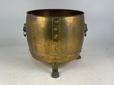Lot 151 - A large brass and copper jardiniere with...