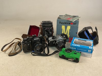 Lot 79 - YASHICA MAT; a fully automatic camera with box...